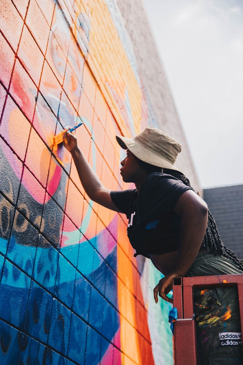 Sydney G. James created the BLKOUT Walls festival in 2021, which featured work from mostly artists of color around Detroit’s North End neighborhood. - Justin W. Milhouse