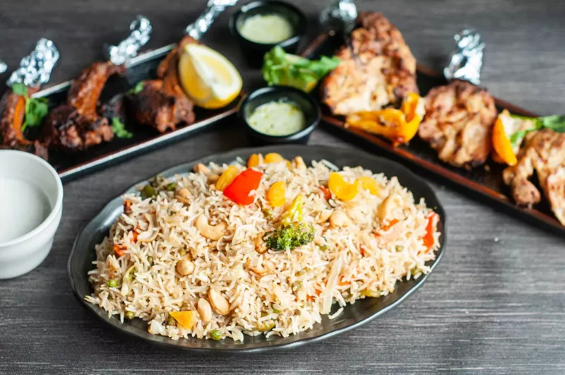 Tandoor lamb chop kabab, vegetable Kashmir pulao, and chicken kalami kabab. - Tom Perkins
