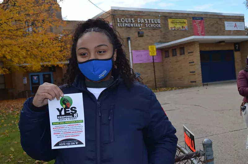 A voter urges a yes vote on the reparations ballot proposal, Nov. 2, 2021. - Ken Coleman