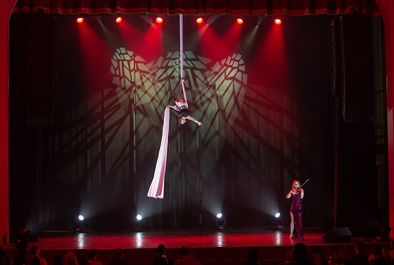 An aerial dancer and violinist perform in the Masonic Temple’s Cathedral Theatre. - Brian Widdis