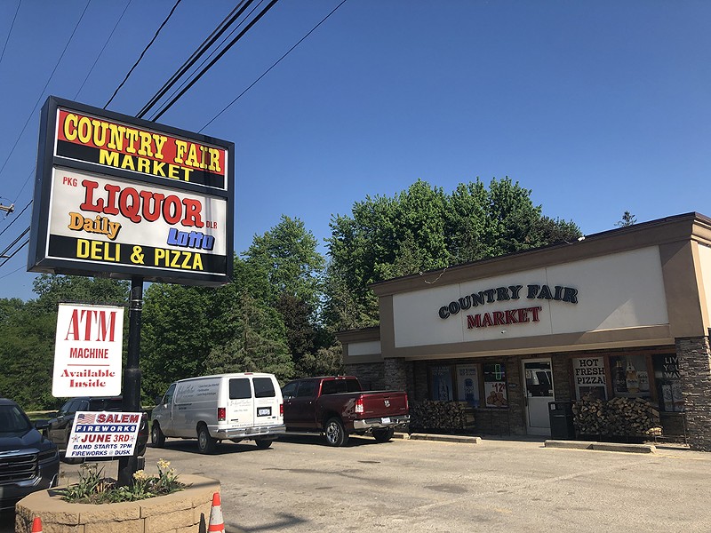 Country Fair Market’s unassuming liquor store front belies a big-time, blue-ribbon, bird-broasting operation. - Lee DeVito