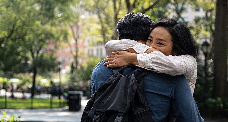 Nora (Greta Lee) embraces childhood sweetheart Hae Sung (Teo Yoo). - Courtesy A24 Films