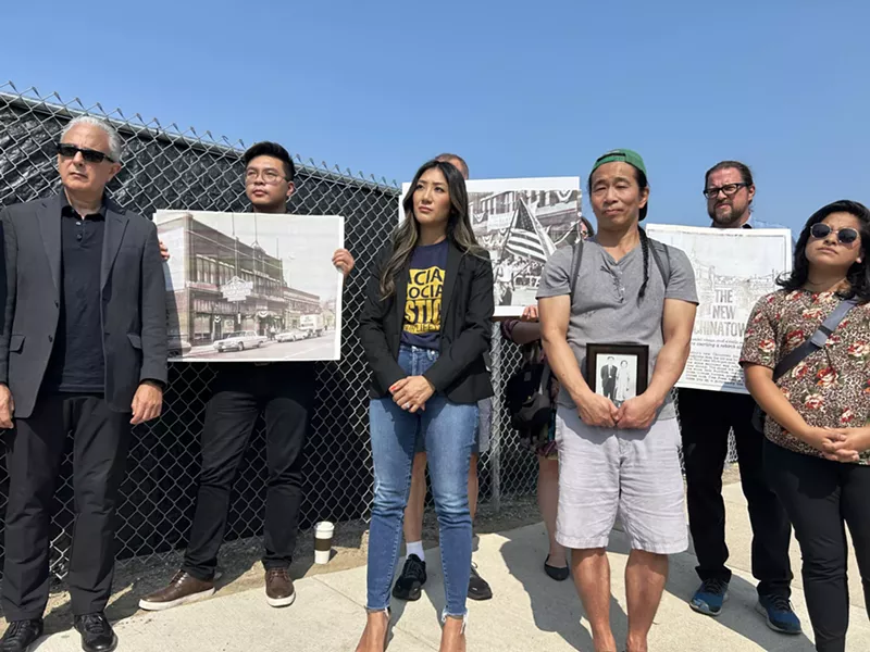 Asian Americans and preservationists mourn the demolition of a 140-year-old building in Detroit's old Chinatown neighborhood in the Cass Corridor. - Steve Neavling