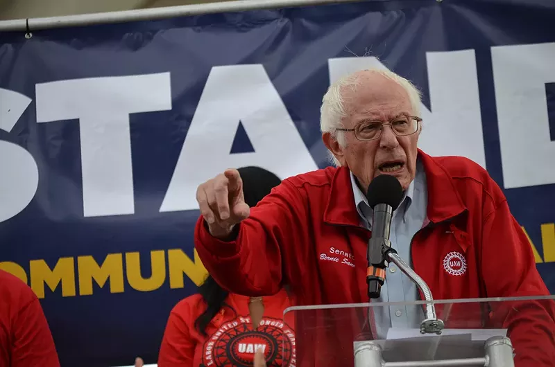 U.S. Sen Bernie Sanders (I-Vermont) spoke against ‘corporate greed’ and ‘record profits’ secured by the Detroit Three during a rally on Friday with striking UAW workers just 500 feet from the North American International Auto Show charity fundraising event. - Ken Coleman