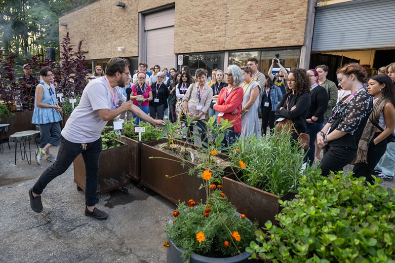 Stamps 2D media studio coordinator Nicholas Dowgwillo shows the new Sustainable Materials & Color Garden to students and faculty. - Courtesy photo