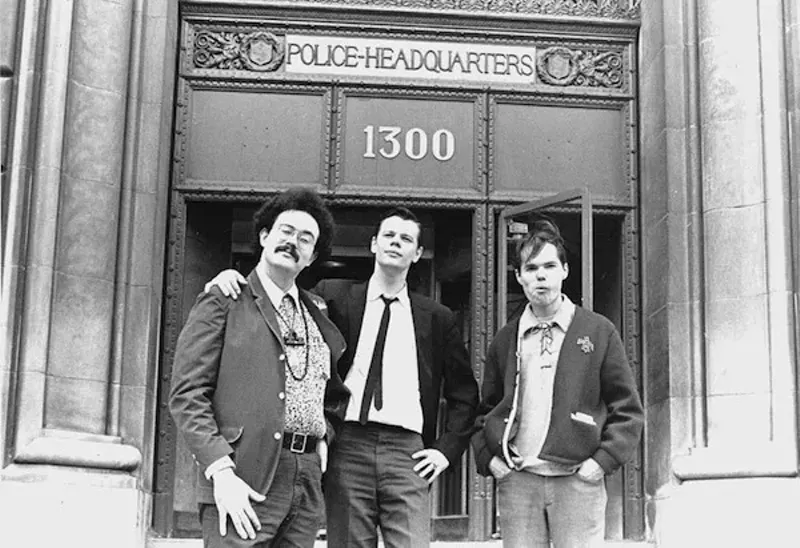 John Sinclair, Joe Mulkey and Billy Reid of the Detroit Artists Workshop after obtaining the license to hold the Love-In from the City of Detroit at Police Headquarters at 1300 Beaubien in the spring of 1967. - PHOTO BY LENI SINCLAIR