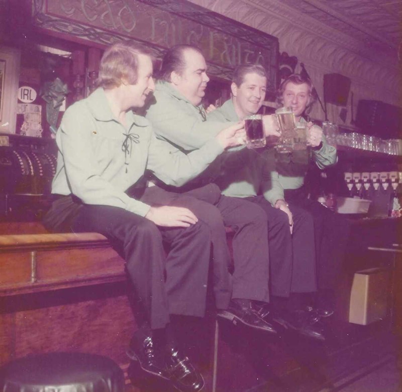 Charlie Taylor (second from left) bending elbows with fellow pub performers. - Courtesy photo