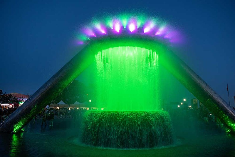 The restored Dodge and Son Memorial Fountain lights up during Movement Music Festival. - Kahn Santori Davison