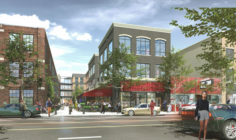 A street-level view of Trumbull just north of Michigan. The development includes a "greenway," and we think it's that walkable area next to the restaurant with outdoor seating.