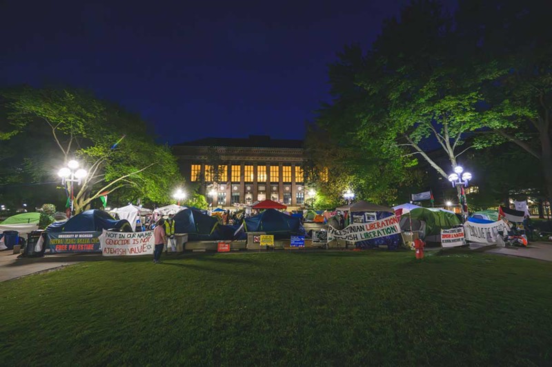 Night falls on the student protest encampment on the U-M Diag. - Doug Coombe