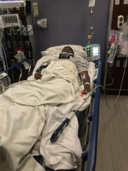 Lavell McGee with serious injuries at a hospital. - Courtesy of Marko Law, PLLC