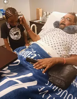 Malik Shabazz in the hospital. - Courtesy