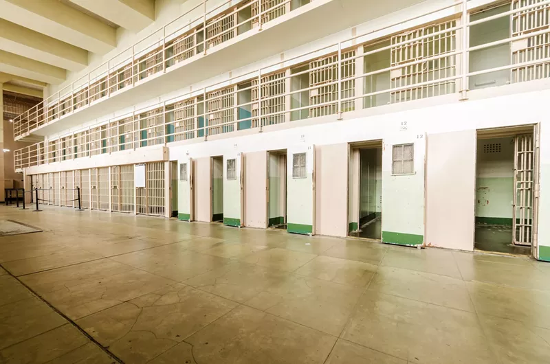 A former employee of the Michigan Department of Corrections has sued the agency and its spokesman for alleged retaliation, sexual abuse. - Shutterstock.com