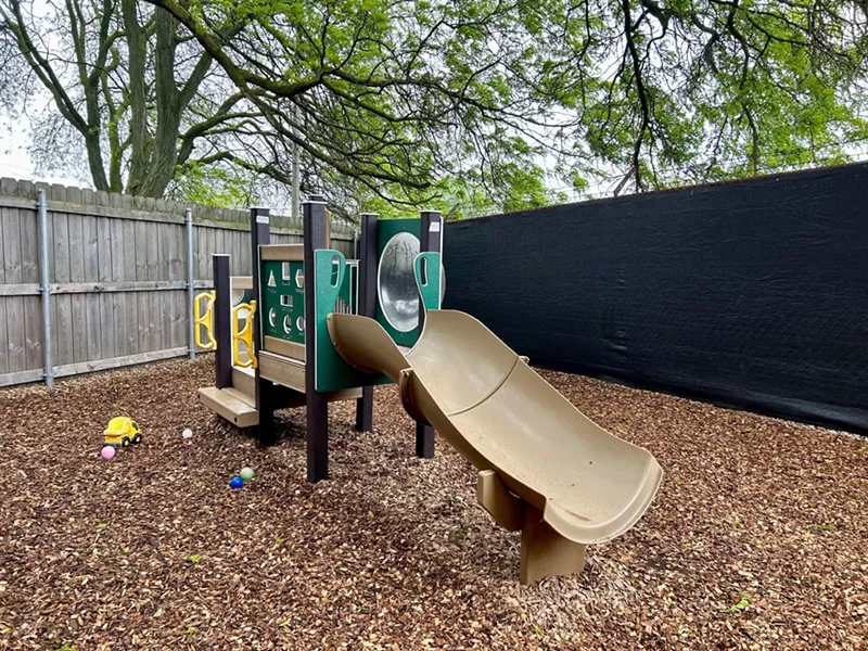 The school says it will have to eliminate this playground for infants and toddlers because it's too close to the Chick-fil-A site. - Steve Neavling