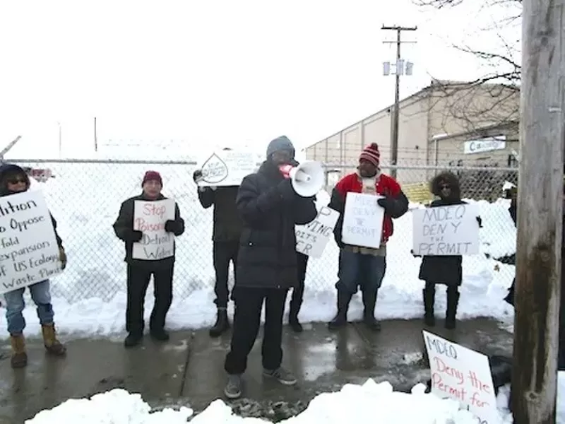 Protestors affiliated with the Coalition to Oppose Expansion of US Ecology protest outside the company's Georgia Street facility. - Photo by Michael Jackman