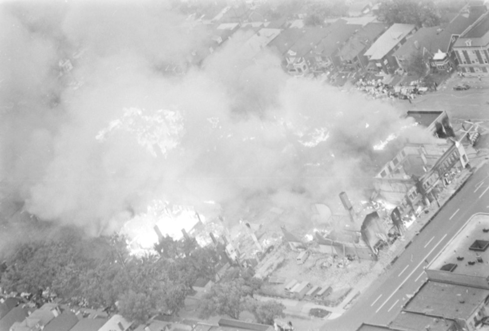 An aerial view of Grand River as buildings are consumed by fires. - Walter P. Reuther Library, Archives of Labor and Urban Affairs, Wayne State University