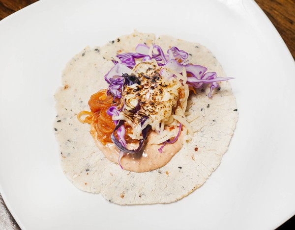 Vegeterian barbacoa taco with seared spaghetti squash that's tossed with barbacoa sauce, red cabbage ensalata, chipotle mayo, and Chihuahua cheese. - Tom Perkins