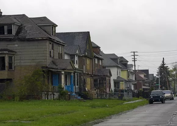 A row of dilapidated houses at Crane and Charlevoix on Detroit's east side. - Steve Neavling