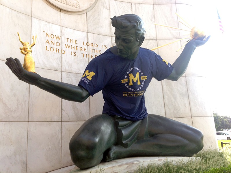 The Spirit of Detroit decked in maize and blue in honor of the University of Michigan's bicentennial. - LEE DEVITO