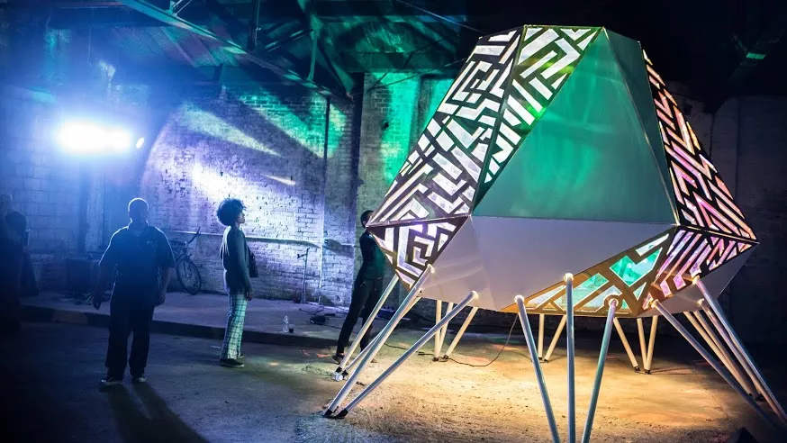 DAMI designed and produced an afrofuturistic outdoor visual art and live music performance in Detroit's North End, the city's unofficial Cradle of Funk, during the 2015 Detroit Design Festival. - DESMOND LOVE