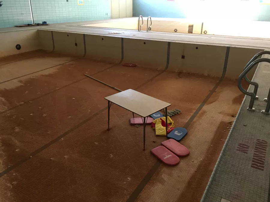 In this photo from the lawsuit, any water in the disused pools at Osborn High School is there only by accident. - Photo courtesy Public Counsel