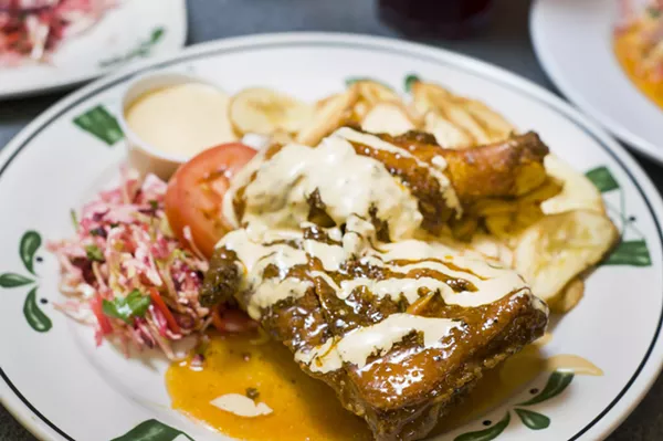 Pollo frito with a mustard sauce at Antonio's. - Tom Perkins