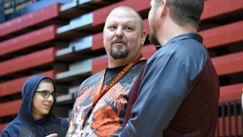 Female wrestling coach, promoter, and advocate Brent Harvey, center, has died. - Photo by Rachel Timlin