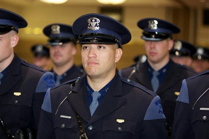 Bessner, among a sea of other white officers, during his Michigan State Trooper graduation in 2012. - Michigan State Police Facebook page