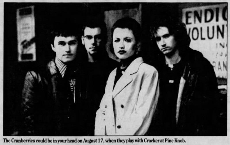 The Cranberries with O'Riordan (second from right) in a promotional poster for their August 17, 1996 concert at Pine Knob Music Theater. - Photo courtesy of The Concert Database.