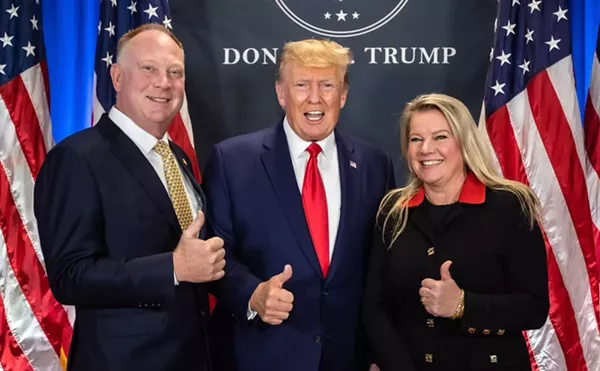 Matt Maddock, left, and Meshawn Medock, right, meet President Donald Trump.