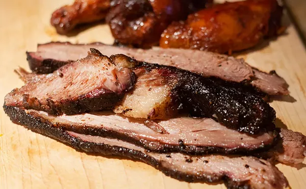Mouth-watering brisket is priced by the pound at Royal Oak’s Holiday Market.