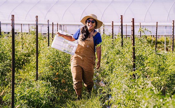 Danielle Daguio of Keep Growing Detroit, one of the organizations sharing the fruits of their labor with Community-Supported Agriculture (CSA) subscriptions.