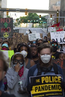 Protesters march in downtown Detroit on Thursday.