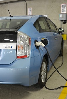 A car being charged at one of the 18 electric vehicle chargers in Ann Arbor.