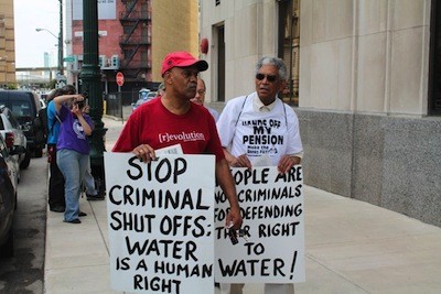 Protesters gathered outside the Detroit Water & Sewerage Department's main office on June 6, 2014. - PHOTO: RYAN FELTON