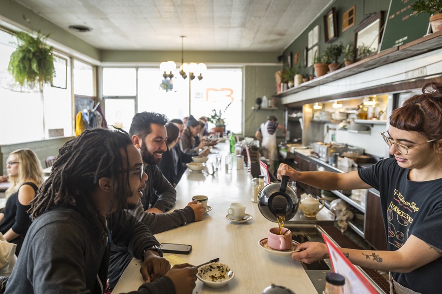 A diverse group of diners meet at Rose’s Fine Food in Detroit. - JACOB LEWKOW