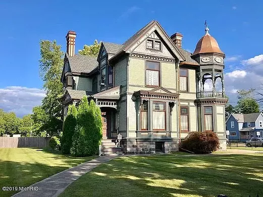 This 1885 Queen Anne House for sale was built by former Michigan Secretary of State Daniel Striker