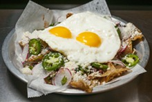 PHOTO BY TOM PERKINS. - Chilaquiles.