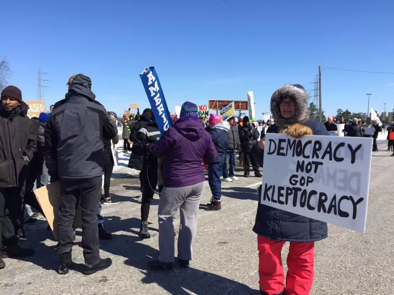 The 17 best protest signs we saw at Trump's visit to Ypsilanti