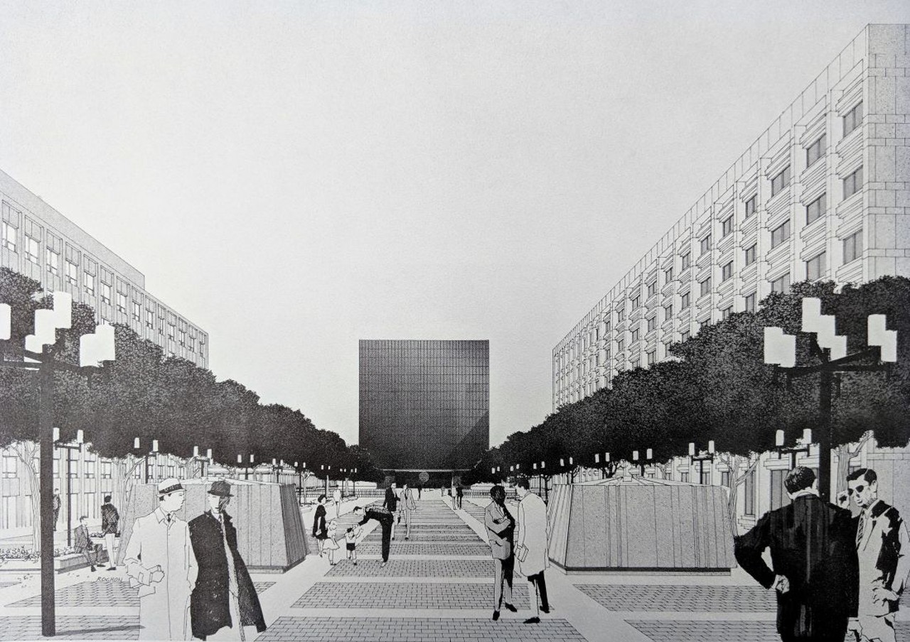 Scheme B 
According to a booklet that included renderings of the development, Scheme B included a 200 foot cube raised above a plaza with a legislative complex below the plaza. The House and Senate chambers would have been placed below plaza-level, while the second and third floors would have been devoted to the governor and his staff. Legislative offices would have been located on the floors above. The height of the legislative chambers was envisioned to extend the full height of the building; the lawmakers' offices would have made up the upper walls of the chamber. The proposal included 1,100 spaces of below-ground parking.
Building Gross Area: 574,400 sq. ft.
Building Net Area: 321,150 sq. ft.