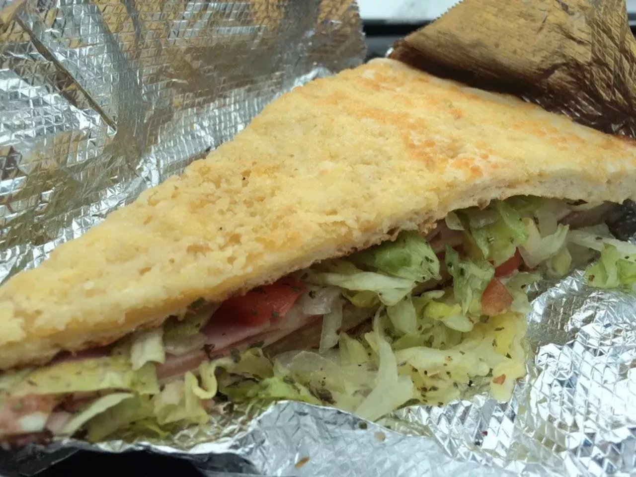 Dan & Vi&#146;s Pizza Deli 
Detroit | 5951 Chene St. | (313) 924-6077 
The Deli Slice is a sandwich and pizza experience unlike any other. Instead of an italian sub sandwiched with bread, Dan & Vi&#146;s serves the inside of an italian sub wrapped in their delicious pizza. (Photo: Phoebe J., via Yelp)