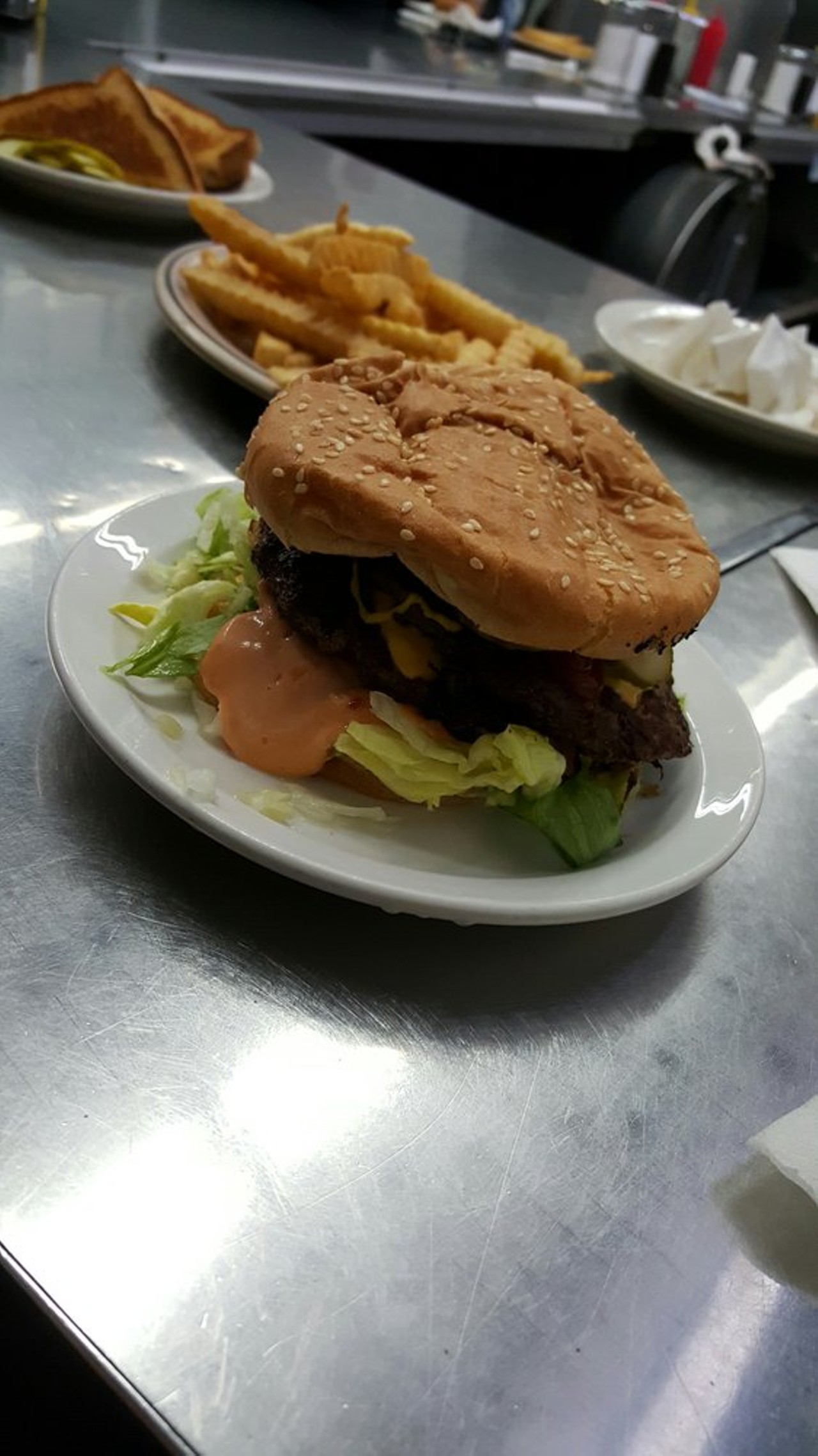 Brayz Burgers 
Hazel Park | 22941 Dequindre Rd | (248) 541-8878 
You&#146;re hungry, you have $5 in your wallet, but you still want something tastey, well if this happens to you on a Wednesday or a Tuesday then head over to Brayz Burgers, for $1 Cheeseburgers and Coneys. (Photo: Ricky D., via Yelp)