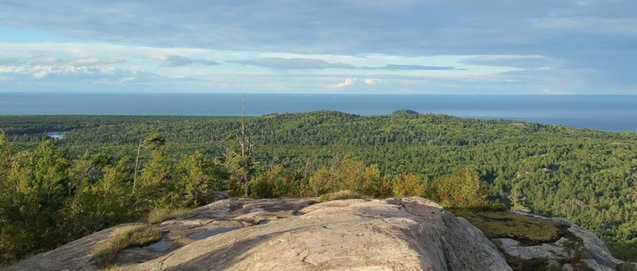 Hogback Mountain
Marquette
Getting to the top of this popular summit is a great feat, even for the best of hikers. The strenuous hike will take you up twisting, narrow trails, over rocks, and through swampy areas. However, the views at the top are breathtaking and worth the long trek.
Photo via Google reviewer Greg Mowatt