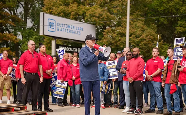 President Joe Biden addresses UAW members walking a picket line at the GM Willow Run Distribution Center, Tuesday, September 26, 2023, in Belleville, Michigan.