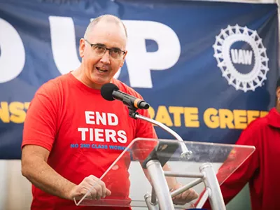 UAW President Shawn Fain speaks at a rally in support of the union’s strike against the Big Three automakers.