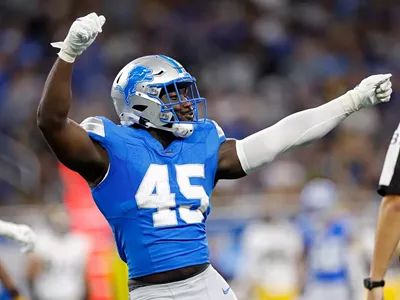 Detroit Lions defensive end Isaac Ukwu (45) in a festive mood.