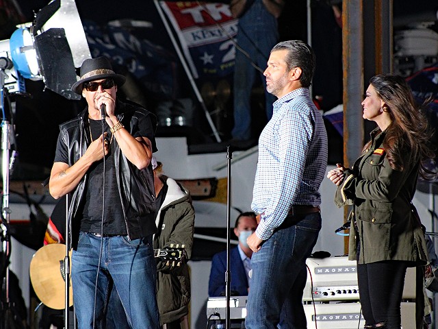 Kid Rock, Donald Trump Jr, and Kimberly Guilfoyle campaign at a Trump rally in Harrison Township in September.