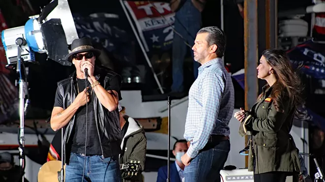 Kid Rock, Donald Trump Jr, and Kimberly Guilfoyle campaign at a Trump rally in Harrison Township in September.