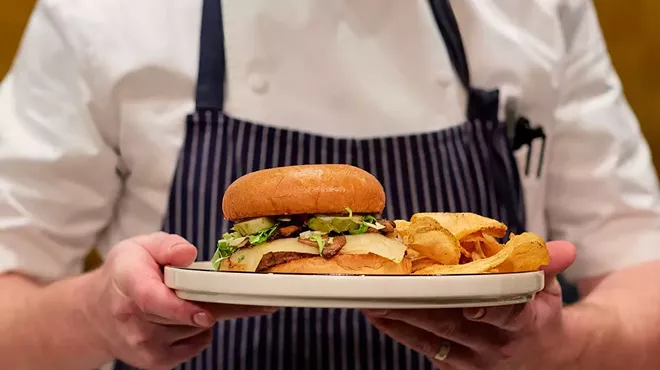 At Hamilton’s, servers wear aprons with the Carhartt logo to commemorate a previous business on the site: a clothing factory owned by Hamilton Carhartt.