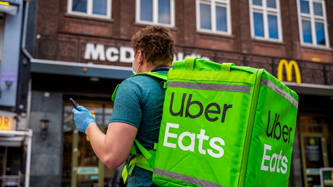 An Uber Eats food delivery man.